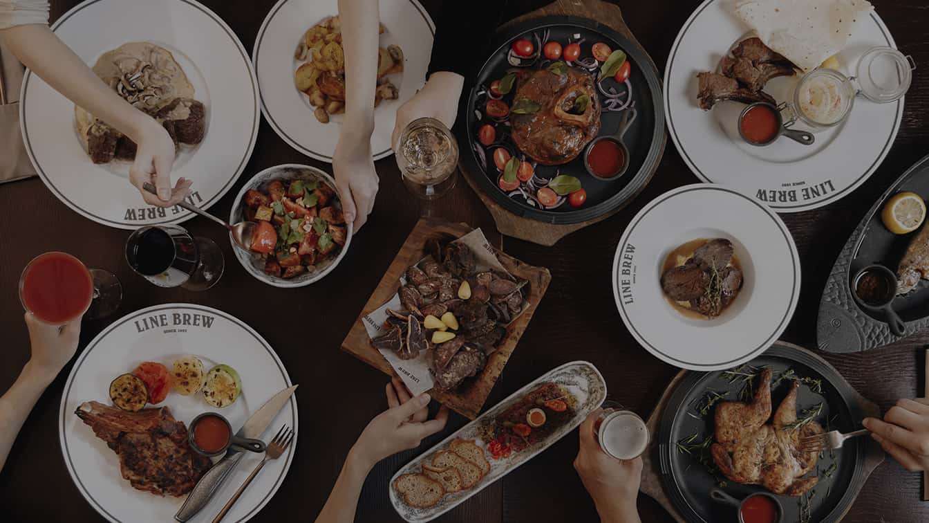 Dishes on a table at the Line Brew Reserve restaurant, view from above